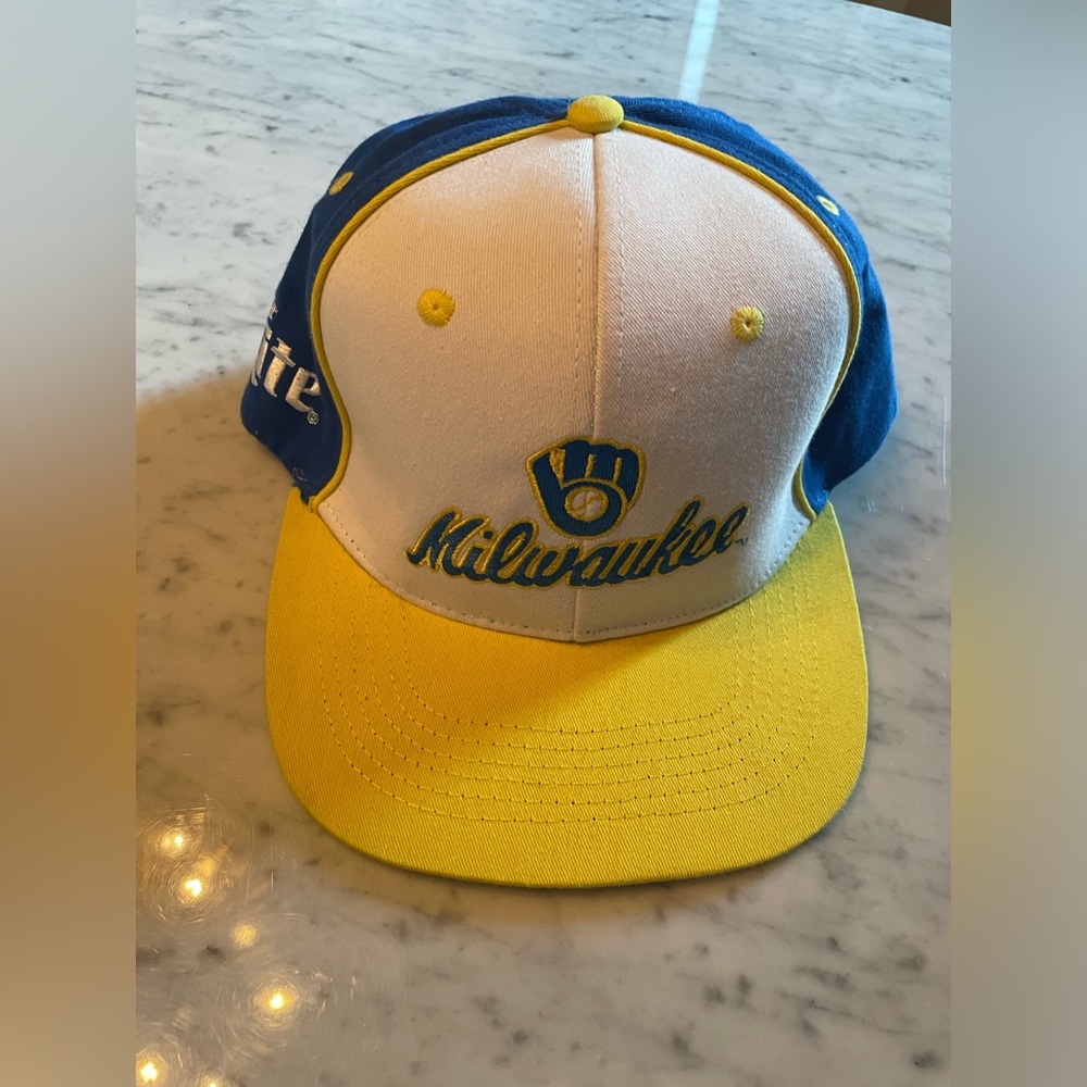 Brand New, never worn Milwaukee Brewers Ball and Glove SnapBack hat.